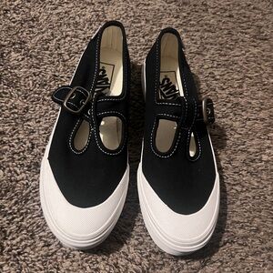 Vans Black and White Buckle mary jane’s Slip-Ons